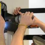 Elevate Your Living Room: Blending TV Wall Mounting with Smart Design