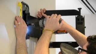 Elevate Your Living Room: Blending TV Wall Mounting with Smart Design