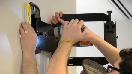 Elevate Your Living Room: Blending TV Wall Mounting with Smart Design